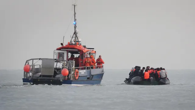 France and UK to stop small boats together, Macron says